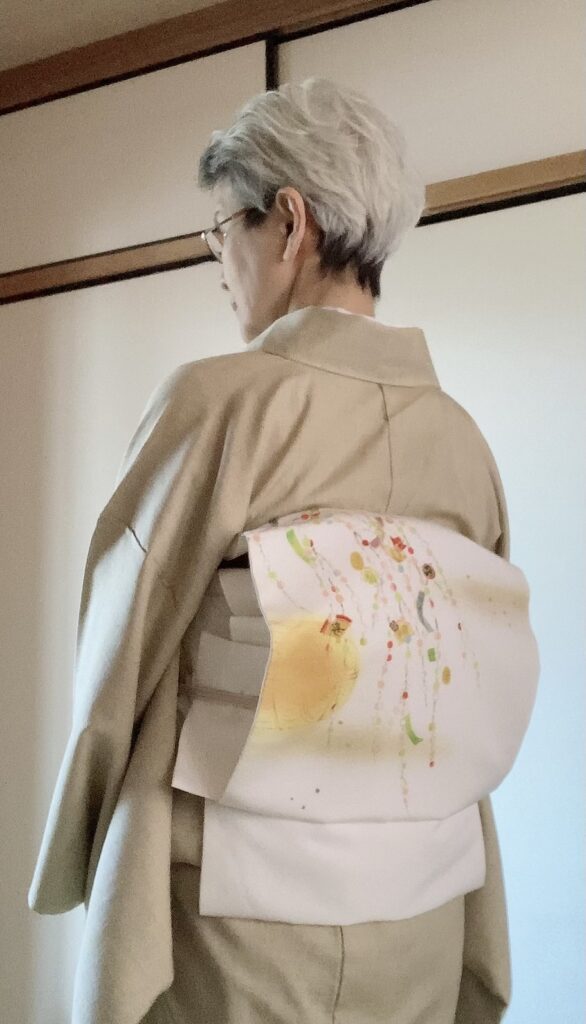 無地紬に恵比寿笹の帯でお正月コーデ