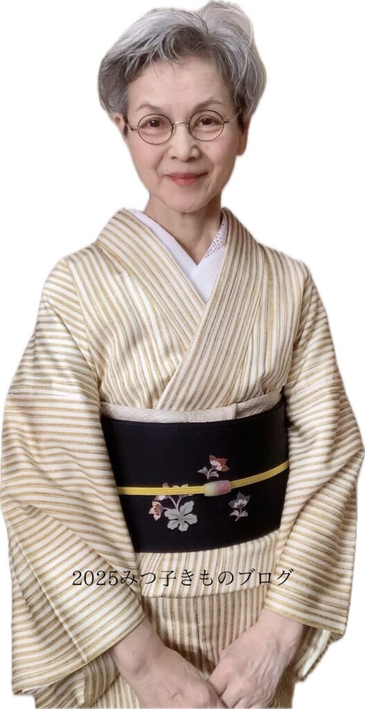 黄色の小紋 × 黒の更紗柄帯 × 黄色の帯締め
