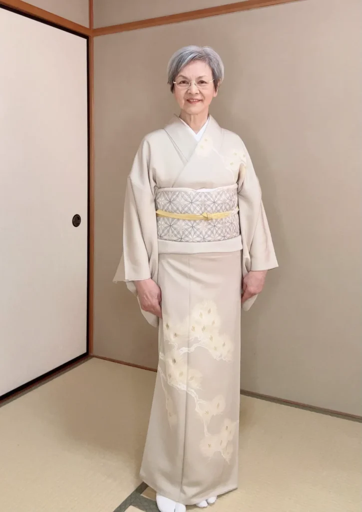 松の柄の付け下げに七宝柄の帯、帯締めの色を効かせて華やかコーデ